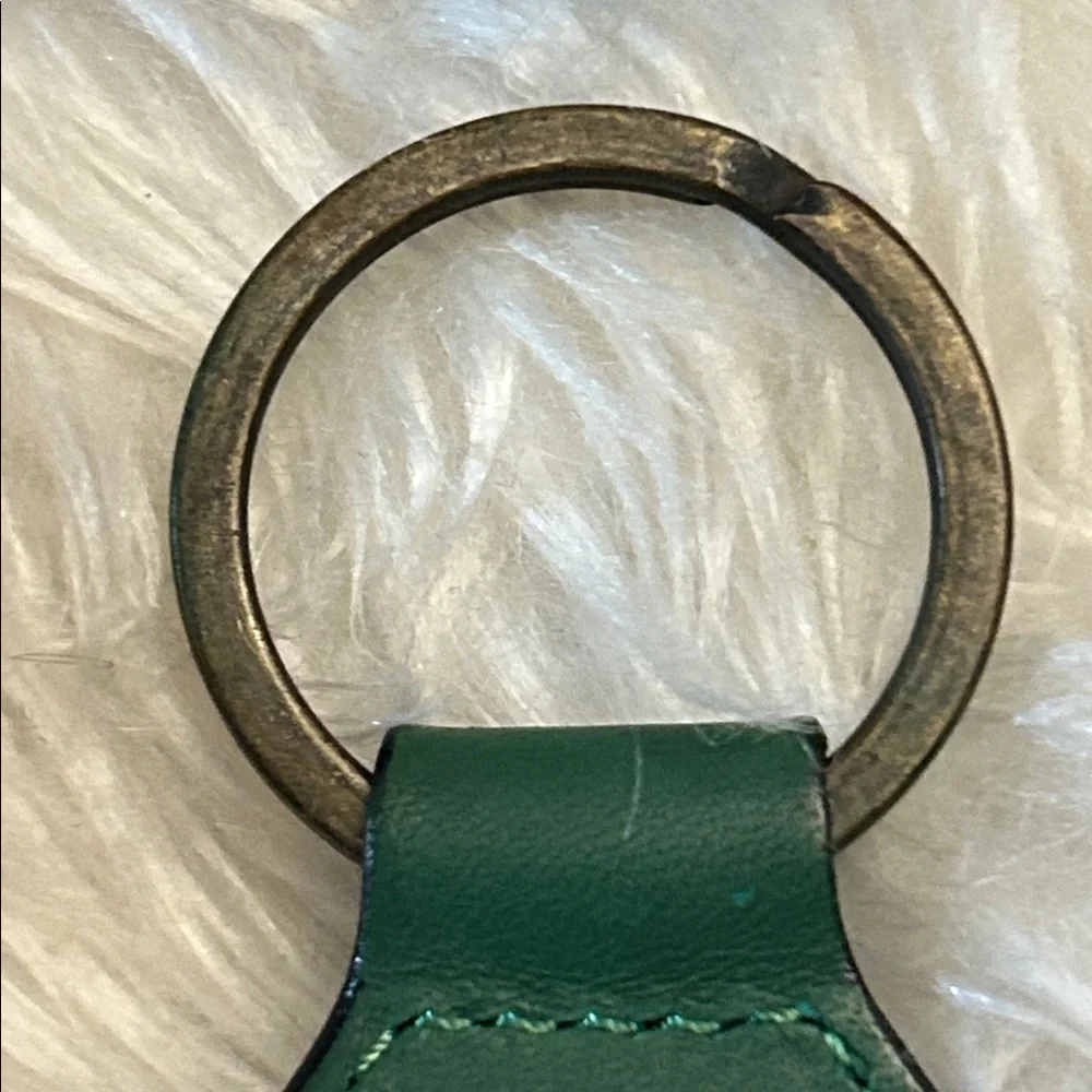 Burberry’s Vintage Green leather keychain with nova check unisex